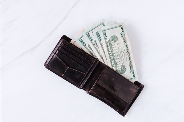 open wallet with cash